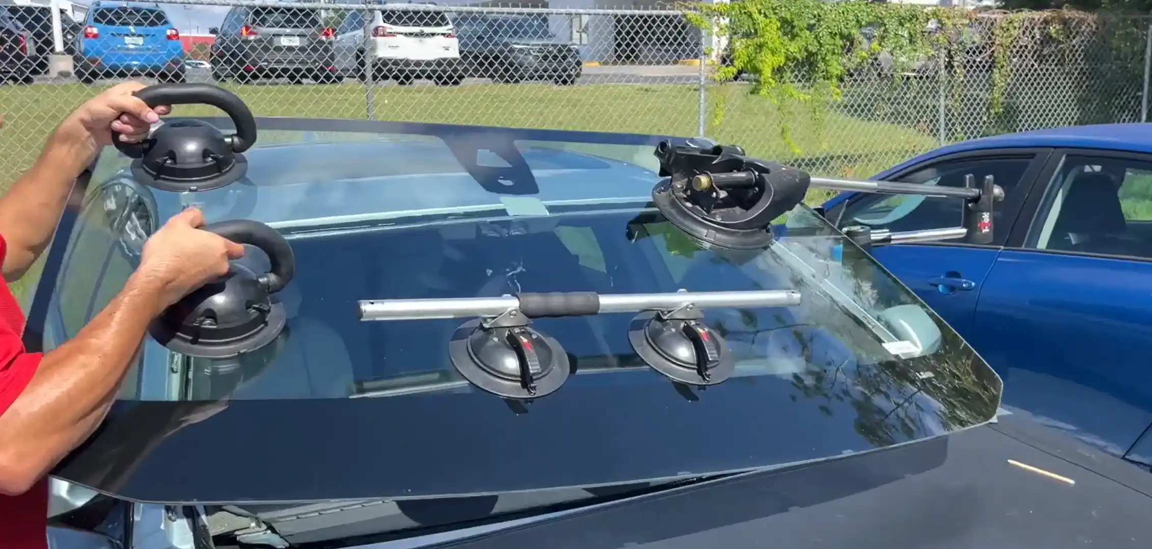 Greeley auto glass technician installing a windshield