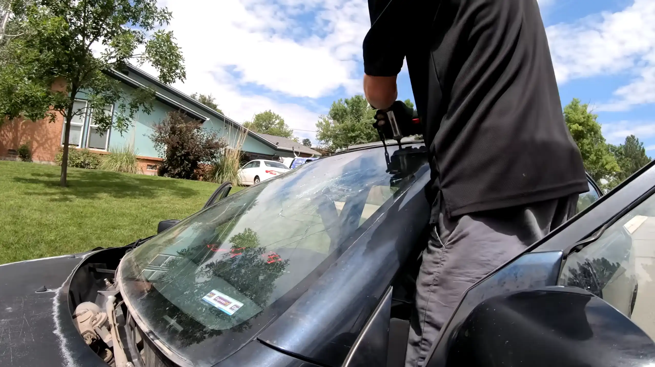 Windshield replacement in progress